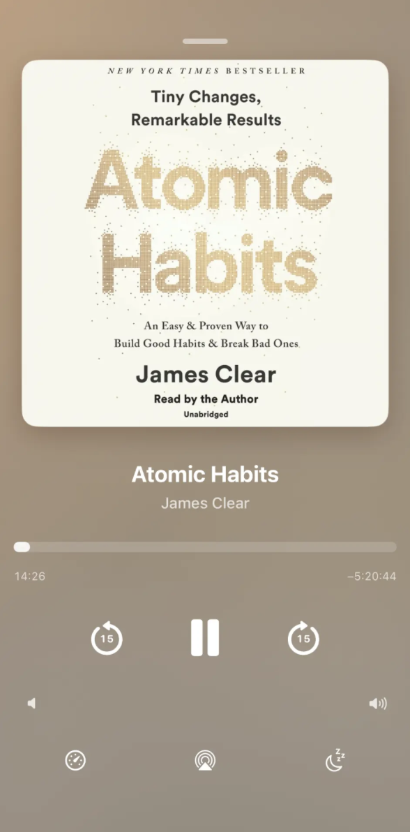 FinBooks audiobook player showing Atomic Habits and playback controls